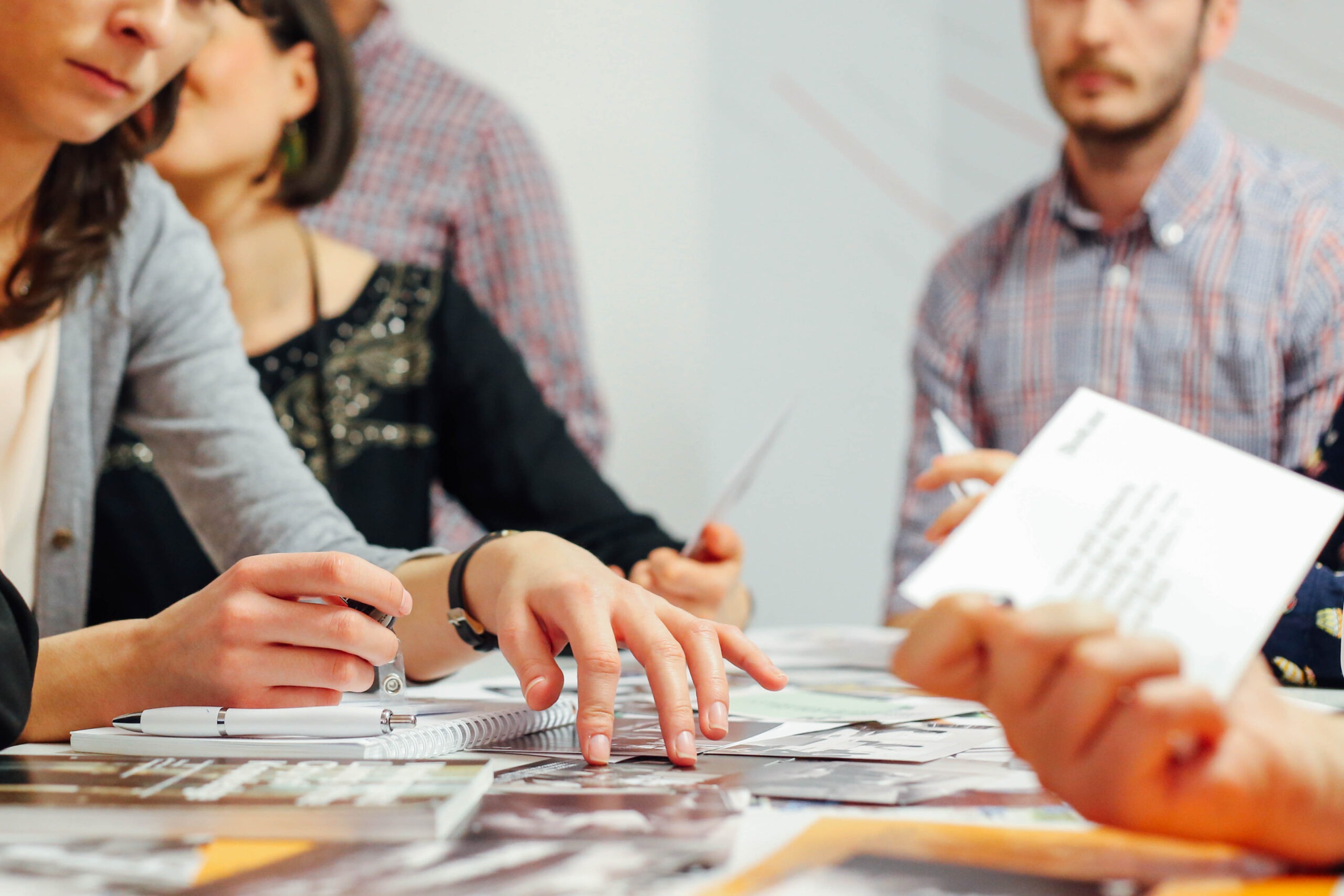 people-at-the-office-reviewing-printed-materials-2024-05-27-01-58-54-utc